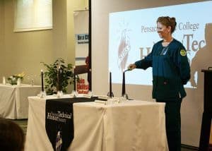 Highly skilled student presenting at the National Technical Honor Society event at Pensacola State C.