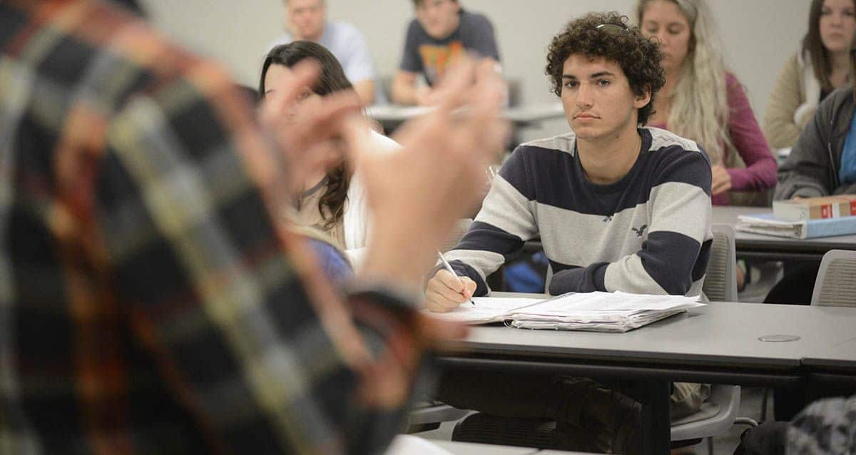 Business Administration students engaged in classroom discussion at Pensacola State College.