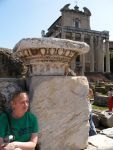 Ancient Roman-style stone fountain and ruins at Pensacola State College Honors Program location.