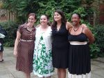 Diverse group of female students smiling at an honors program event.