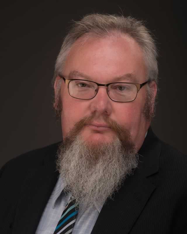Mike Ensley discusses cultural monsters at PSC book talk event in Pensacola.