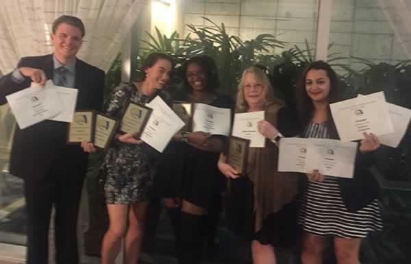 Student award winners at Florida College System conference celebrating academic excellence and recog.