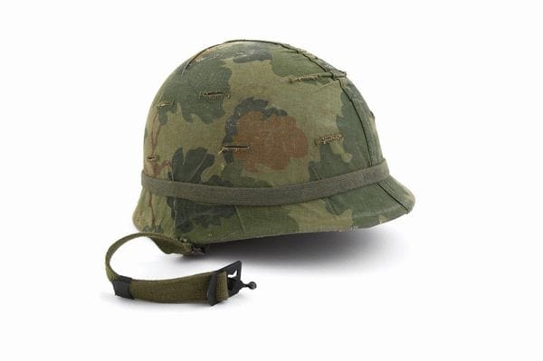 Camouflage military helmet for combat training and tactical operations at Pensacola State College.