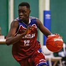 Basketball player dribbling with a basketball, representing Pensacola State College men's basketball.