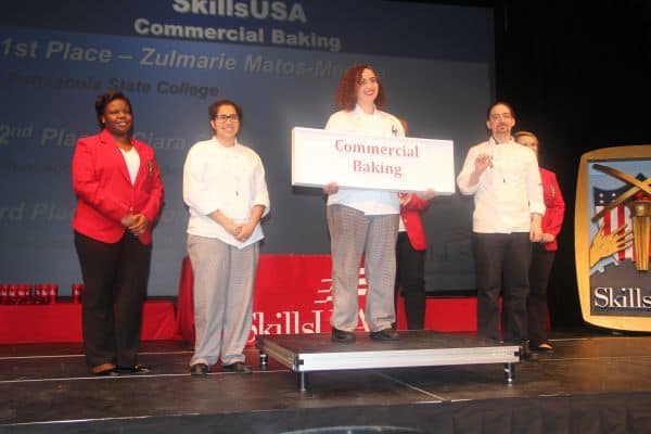 Students celebrating victory at SkillsUSA commercial baking contest.
