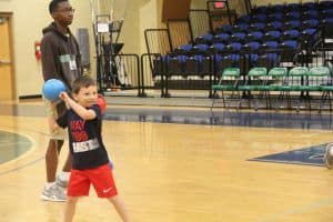 Children participating in educational summer camp activities at Pensacola State College.