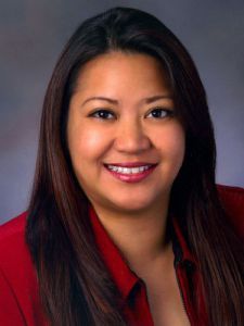 Promoted faculty member at Pensacola State College recognized for academic excellence and leadership.