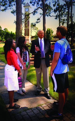 Campus student engagement with faculty during orientation at Pensacola State College.