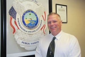 Promoted Pensacola State police officers in uniform at official ceremony.