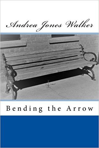 Bench with a book cover titled “Bending the Arrow” by Andreia Jones Walker, highlighting themes of incarceration and social justice.