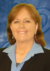 Woman speaking at customer service seminar hosted by PSC and Studer Institute in Pensacola.