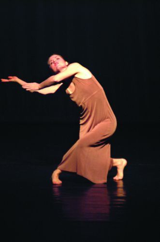 Vibrant dance performance by Swerve Dance Company at Pensacola State College event.