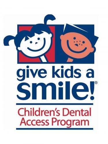 Smile event promoting children's dental health and access on Warrington campus.