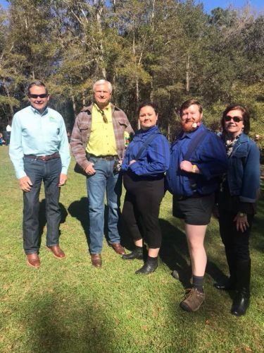 Group of forestry students and winners at 2018 lumberjack competition, outdoor event, Pensacola Stat.