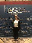 HOSA Florida student at Florida HOSA conference, representing future health professionals.