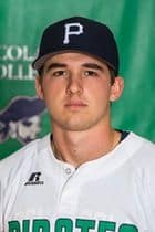 Young male athlete in PSC baseball uniform with cap, representing Pensacola State College sports pro.
