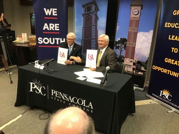 Pensacola State College representatives at signing event.