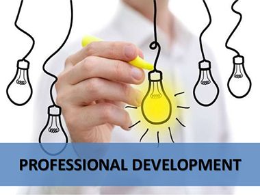 Person drawing a yellow lightbulb among other lightbulb sketches, representing professional developm.