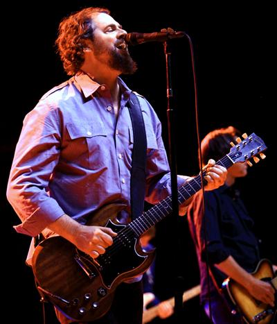 Patterson Hood of Drive-By Truckers playing guitar at Pensacola State College event.