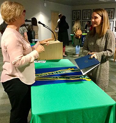 High-achieving students inducted into Sigma Beta Delta at Pensacola State College.
