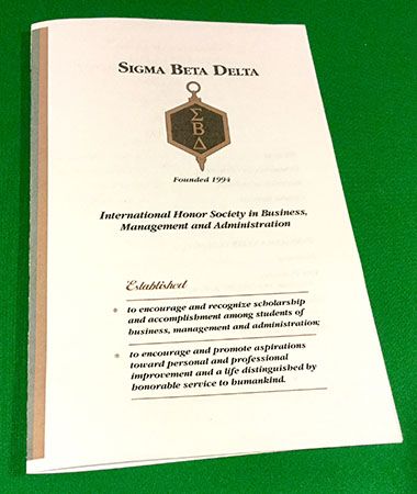 Sigma Beta Delta honor society induction certificate for outstanding business students at Pensacola.