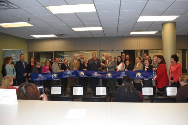 Robinson Honors Program Scholars celebrating at ribbon-cutting ceremony at Pensacola State College.