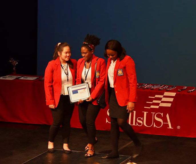 SkillsUSA students from Pensacola State College receiving medals at regional conference.