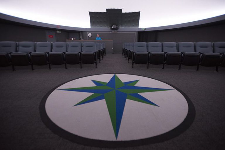 Renovated PSC Planetarium space theater with new seating and advanced projection system for astronom.