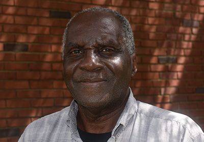 Portrait of Robert Seay, highlighting his role in higher education and community engagement at Pensa.