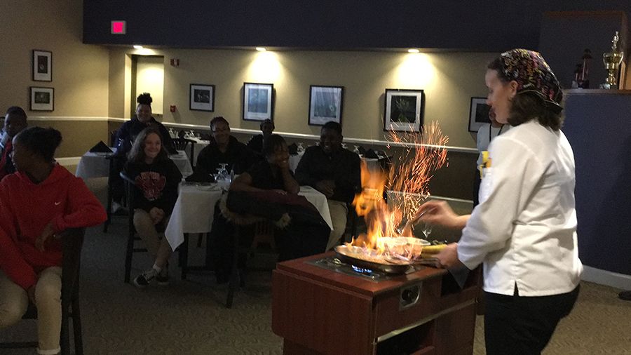 Dixon School students enjoy culinary demonstration at PSC Culinary students at PSC showcase Bananas Foster to Dixon School visitors.