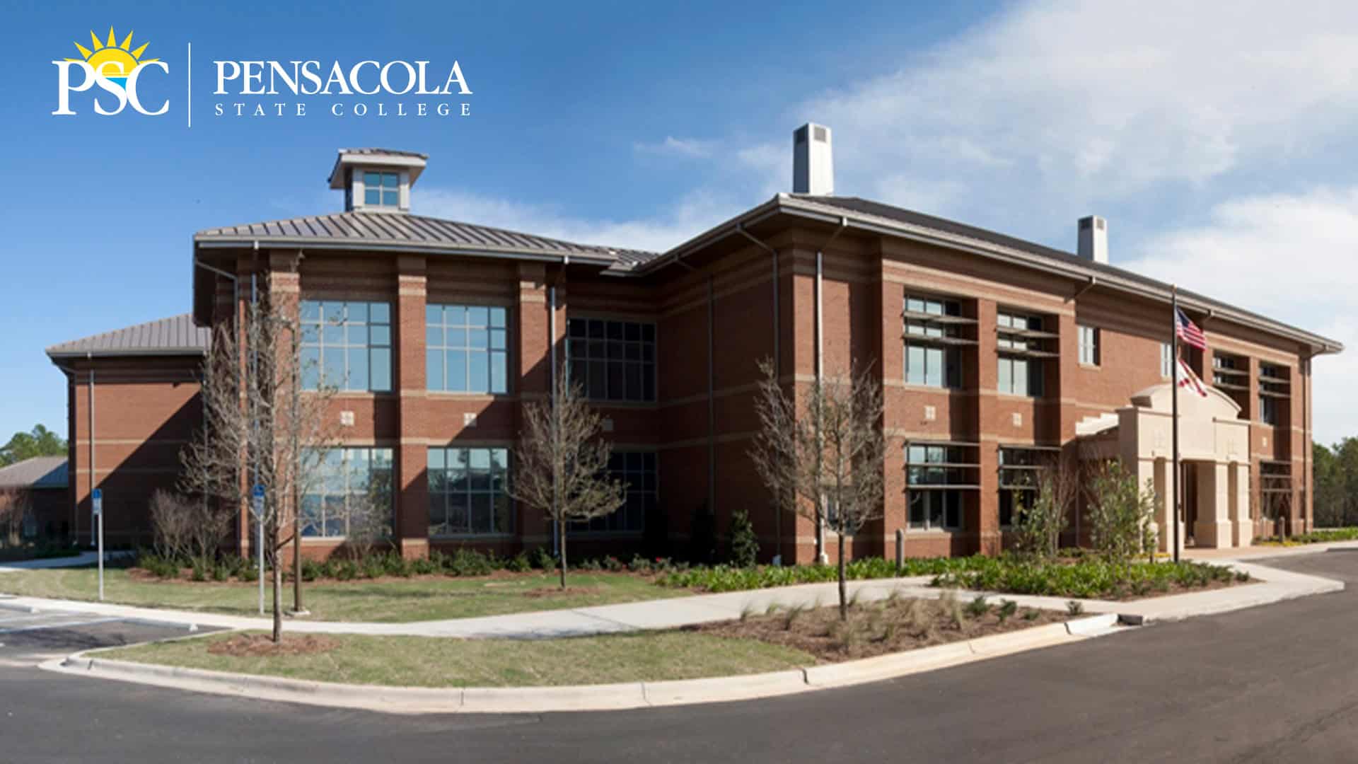 Modern college building featuring Pensacola State College branding and logo, showcasing campus archi.