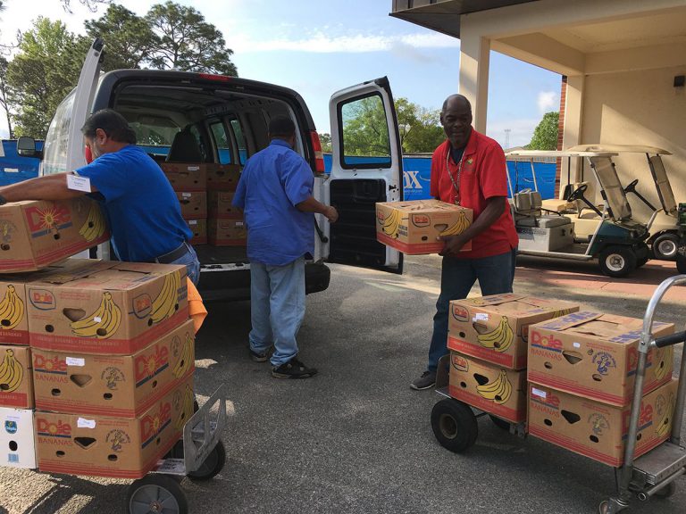 Food donation event at Pensacola State College for vulnerable students.