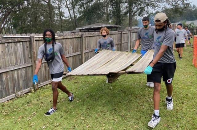 PSC student-athletes help community recover from Hurricane Sally.