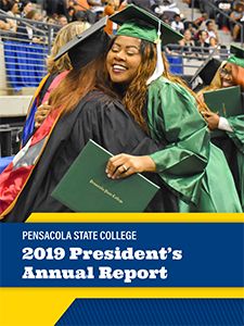 Graduates celebrating at Pensacola State College graduation event.