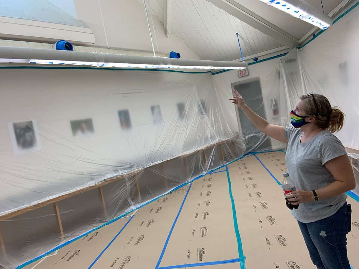 Accessible image of a visual arts instructor preparing for hurricane disruption.