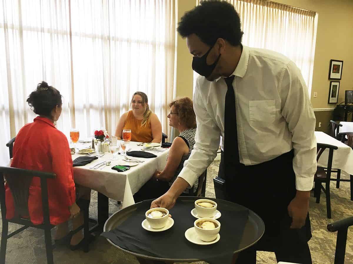 Culinary students serve gourmet dishes during PSC faculty and staff lunch event.