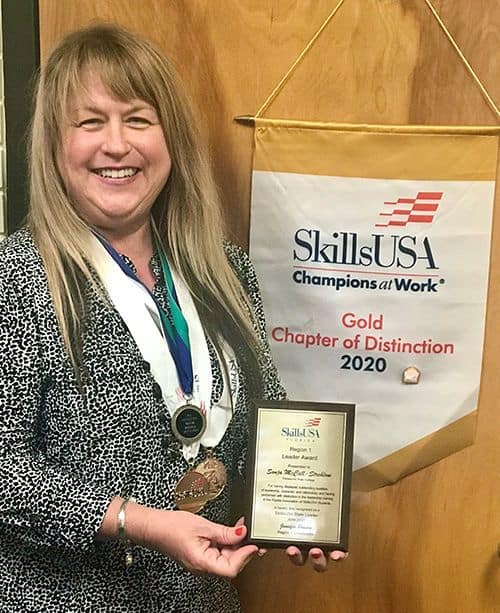 SkillsUSA 2020 Adviser of the Year - PSC programs&rsquo; coordinator with award plaque.