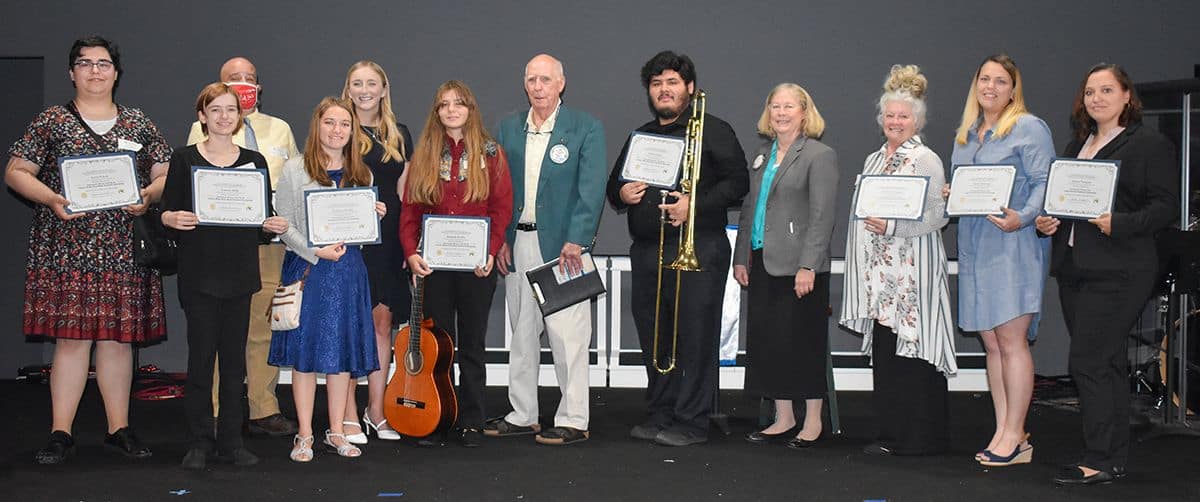 Group of students receiving scholarships from Cantonment Rotary Club at Pensacola State College.