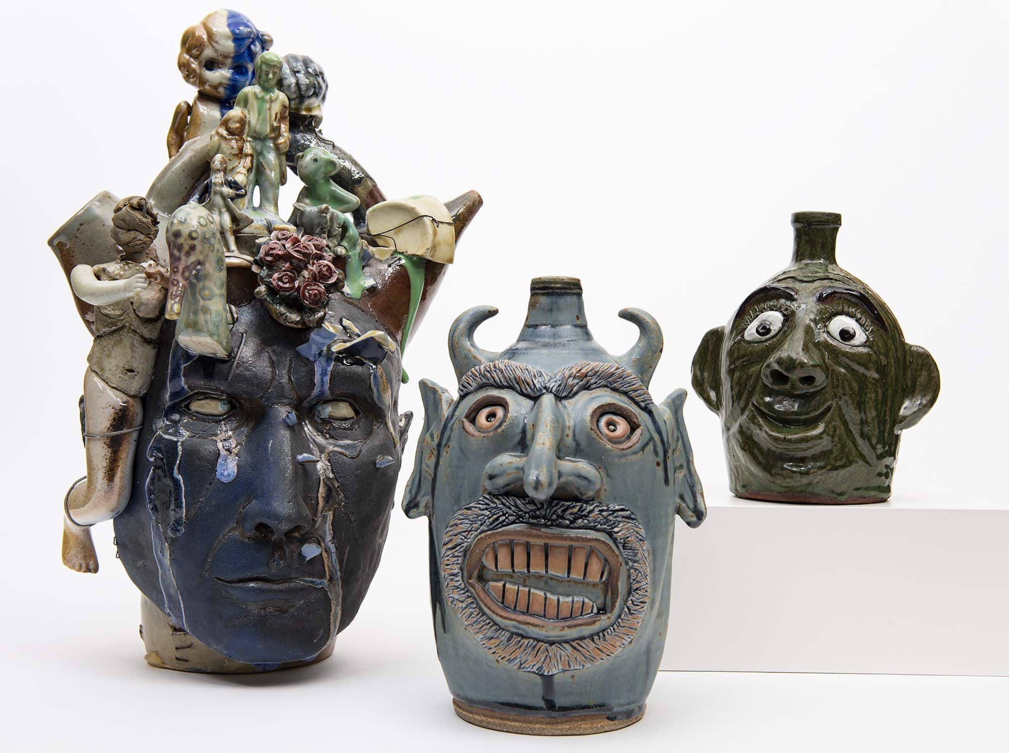 Folk pottery art exhibit showcasing Southern Appalachian influences and academic craftsmanship at Pe.