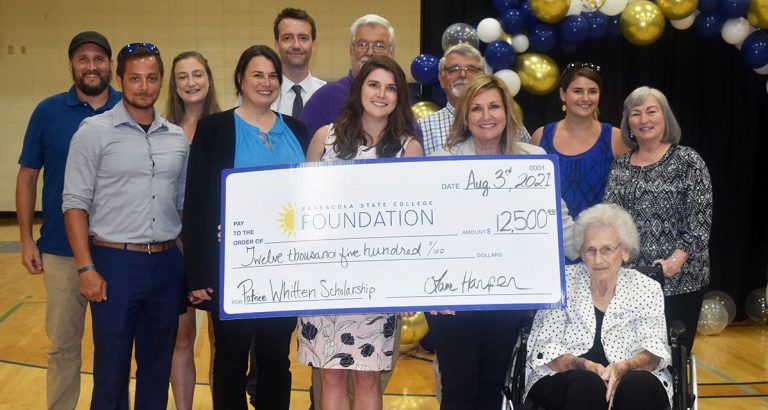 Scholarship donation ceremony at Pensacola State College honoring Patrice Whitten's contributions.