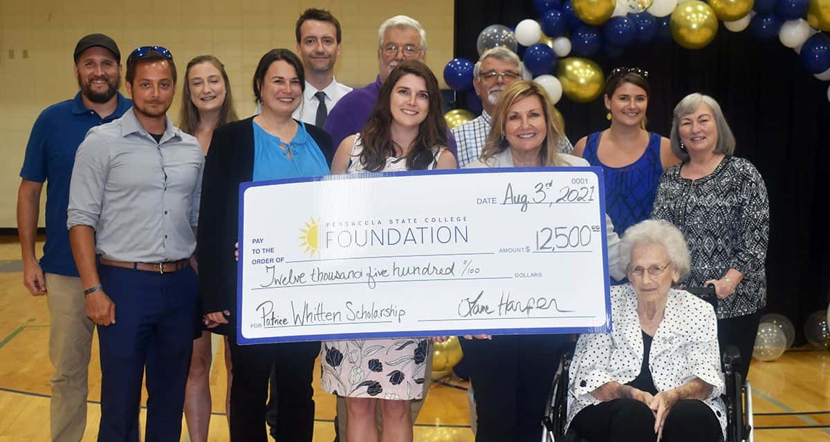 Scholarship donation ceremony at Pensacola State College honoring Patrice Whitten's contributions.