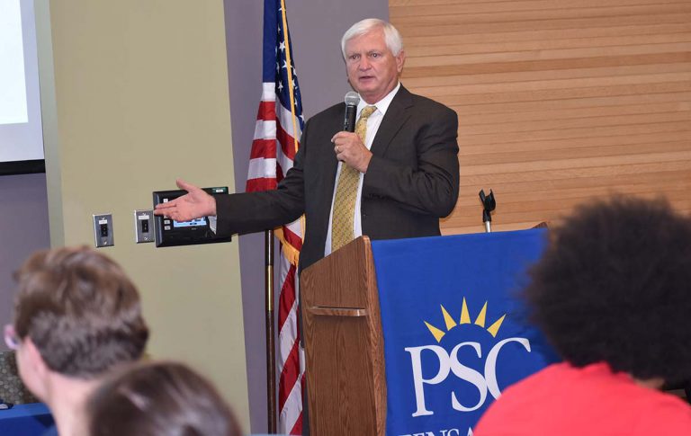Ed Meadows, PSC President, addresses students at a campus event, highlighting college leadership and.