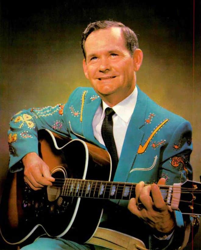 Hank Locklin, country music legend, playing guitar during Suncoast Emmy-nominated documentary.