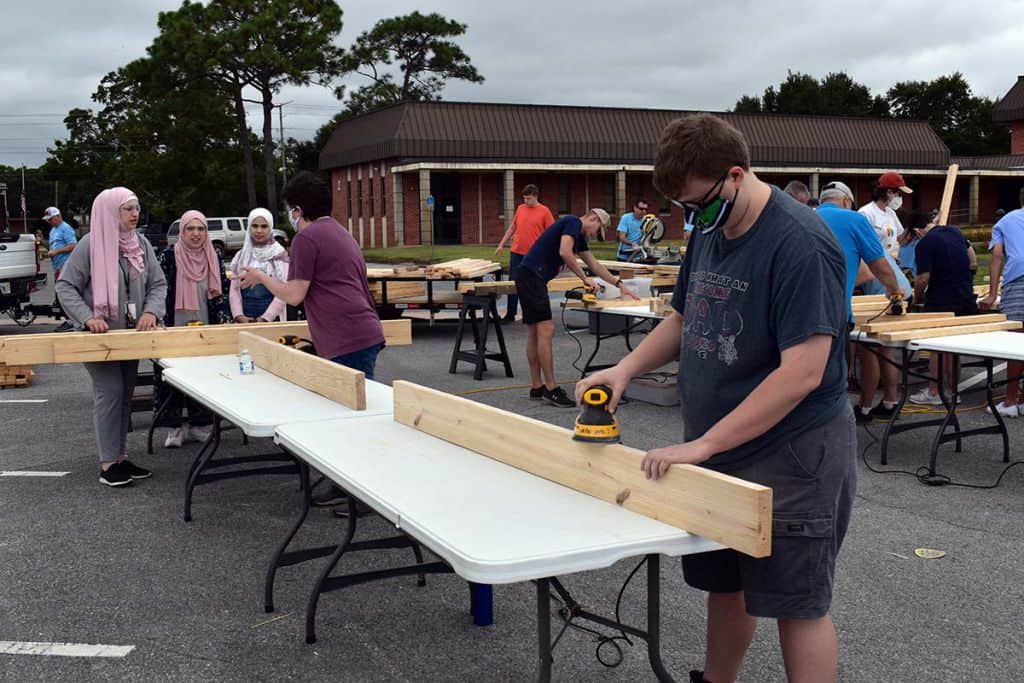 decorative image of sandingboard , Massive turnout of volunteers at PSC for Sleep in Heavenly Peace Bed Build 2021-10-20 13:33:04