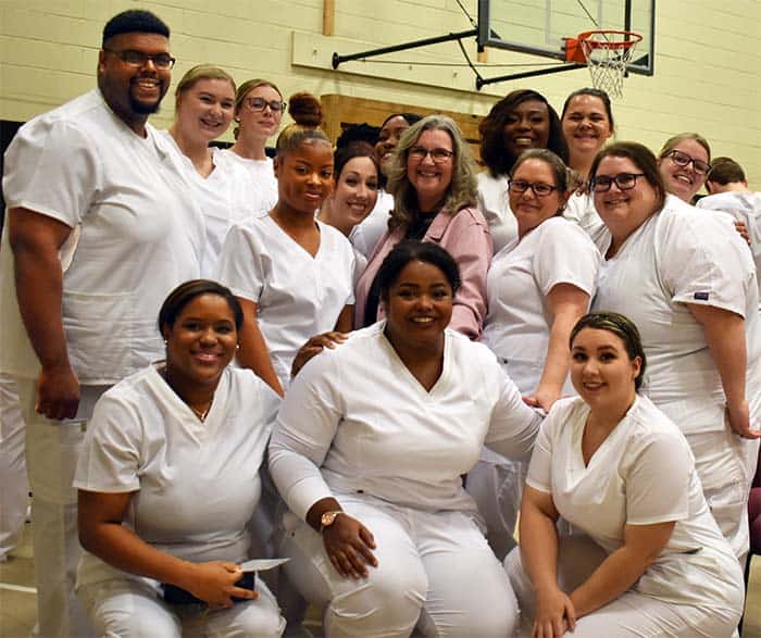 Nursing students and faculty celebrating graduation at Pensacola State College fall 2021 pinning eve.