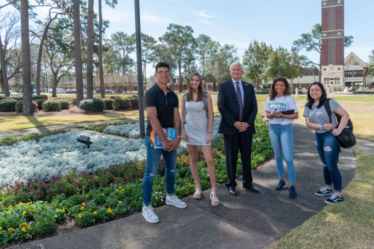 Students and faculty engaging during Discover Pensacola State event on campus.