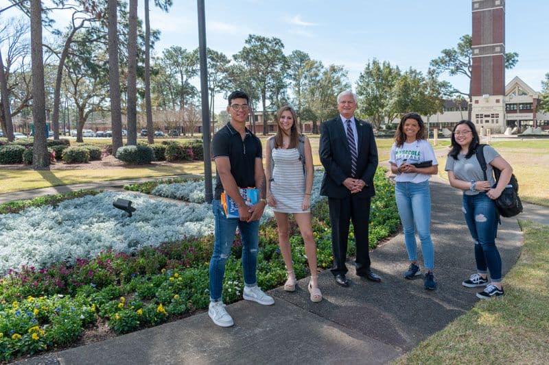 Students and faculty engaging during Discover Pensacola State event on campus.