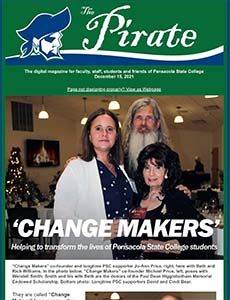 Festive holiday event at Pensacola State College with students and staff in a decorated setting.