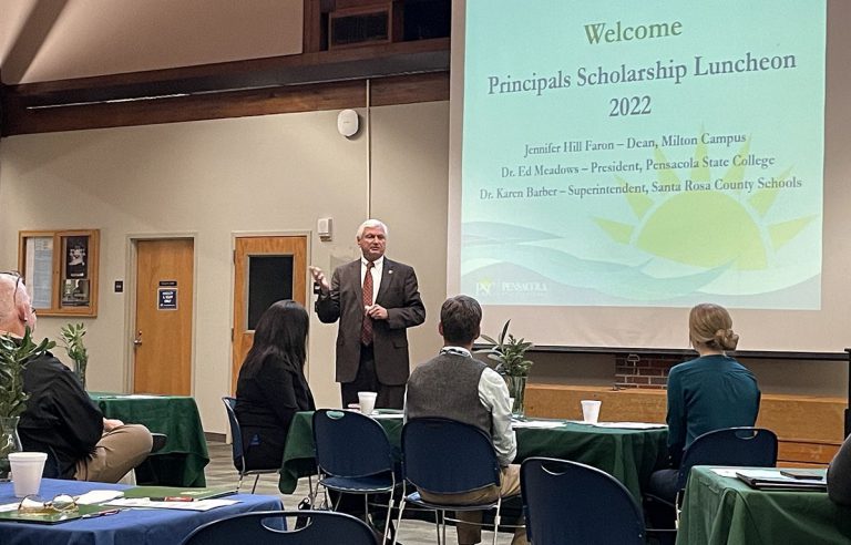 Engaged high school principals and guidance counselors participate in Pensacola State College's Scho.