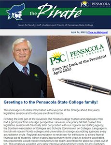 Pensacola State College President greeting students and staff.